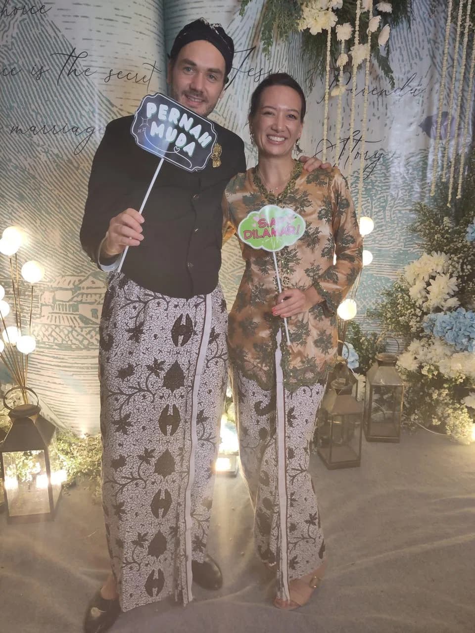 Puri Bahasa students dressed in traditional Javanese batik attire at a cultural event